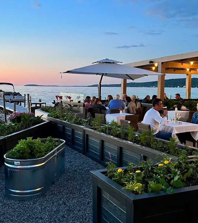 Waterfront patio dining at Magnoliya Grand