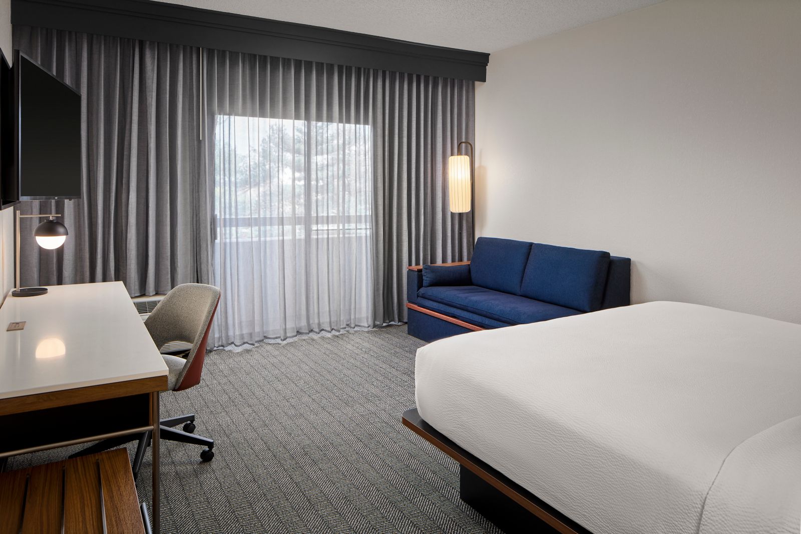 Courtyard by Marriott guest room near Magnoliya Grand